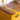 Garden Seed -maitomaalin lämmin, hieman oranssiin taittava keltainen sävy ja luonnollinen mattapinta.
